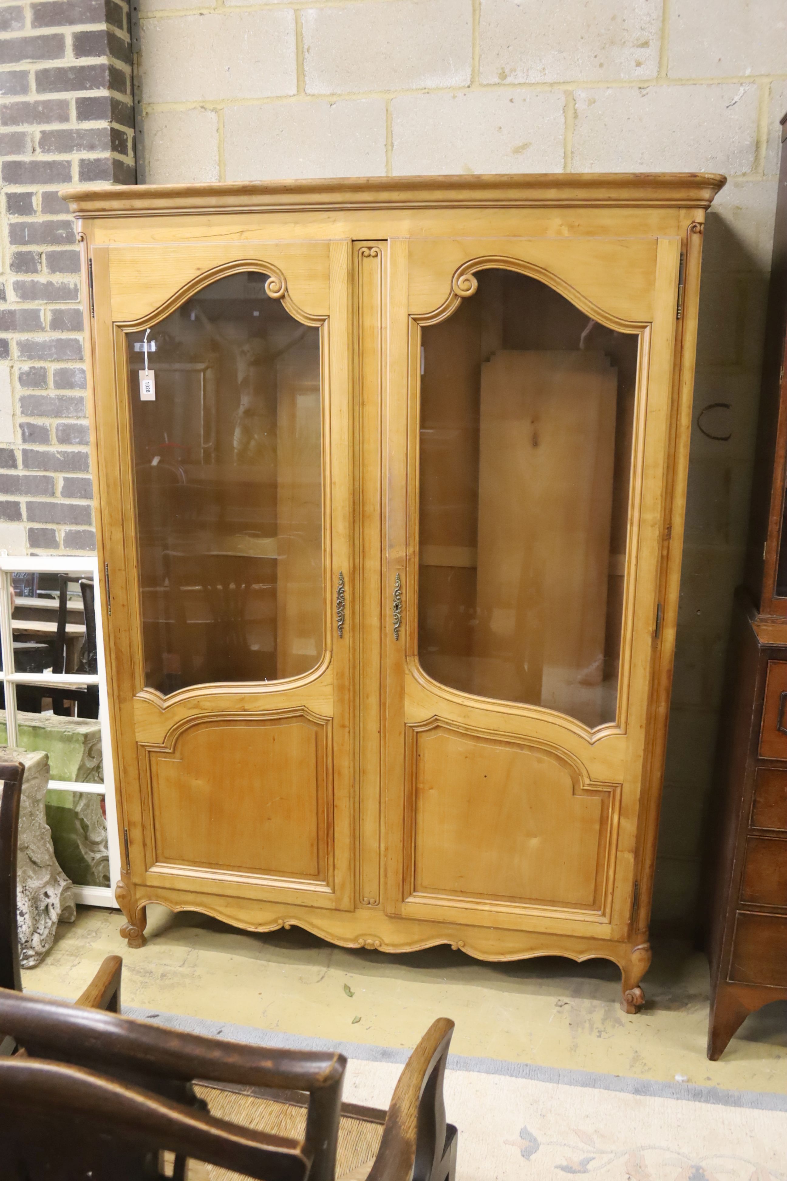 A 19th century French cherry glazed armoire, width 150cm, depth 44cm, height 200cm